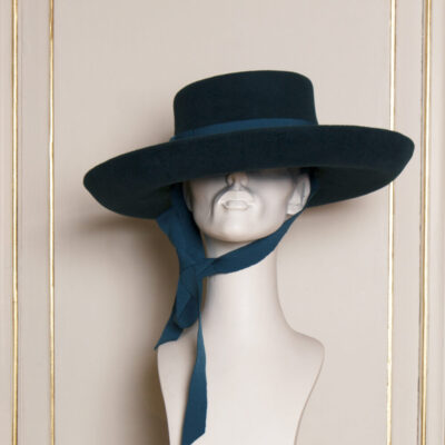 Fashionable Cowboy in teal velours felt.
